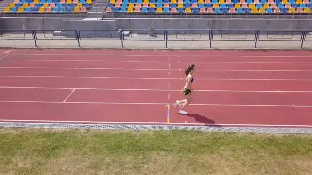 Aérea Joven Mujer Deportiva Correr Estadio Vista Superior Vida Sana — Vídeos de Stock