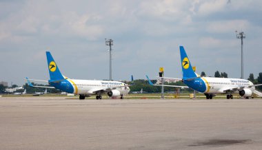 Kyiv, Ukraine - June 23, 2020: UKRAINE INTERNATIONAL AIRLINES BOEING 737-800 The plane lands at the international airport Boryspil. Terminal Runway D. clipart