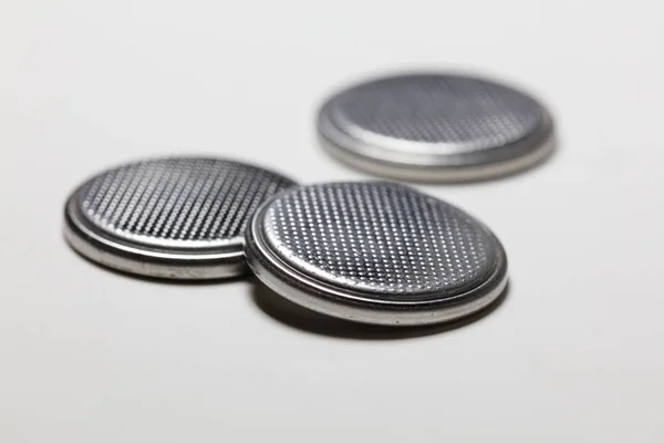 Silver Button Cell Battery White Background — Stock Photo, Image