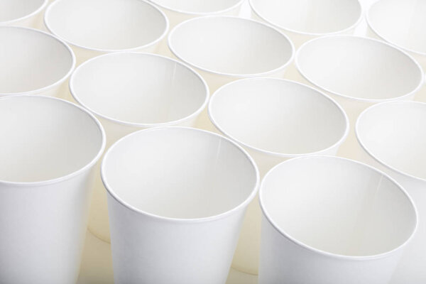 White paper coffee cup on white background.