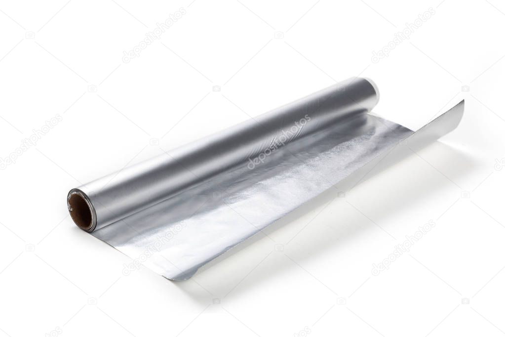 Aluminum foil roll on the white background, close up.