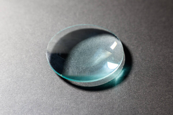 Optical convex lens, glass lens close up.