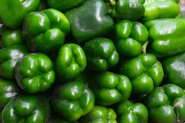 Green bell peppers background