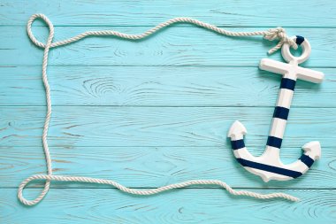 Bir çapa ile halat yapılmış çerçeve. Yaz saati deniz tatili konsepti.