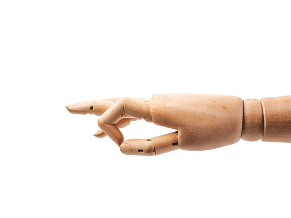 Mão de boneca de madeira fazer dedos para tocar no terreno de panificação branco — Fotografia de Stock