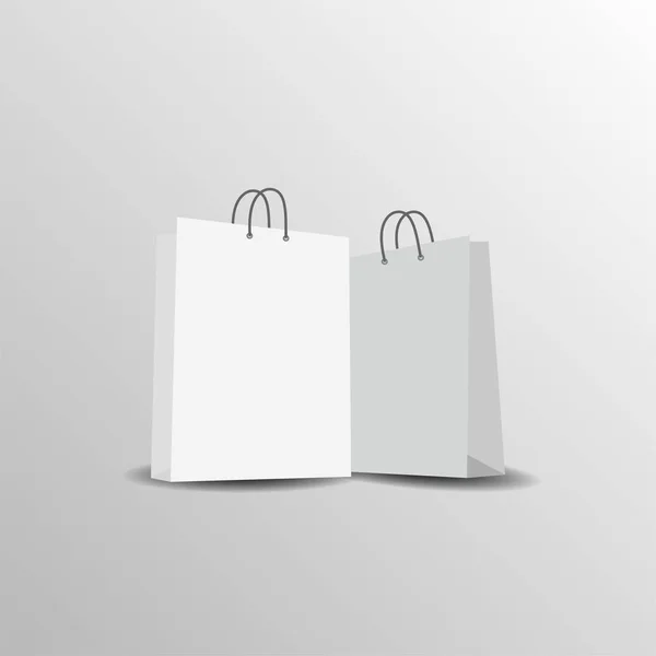 Две пустые бумажные белые сумки для покупок . — стоковый вектор
