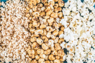 Patlamış mısır, karamelli mısır ve buğday gevreği.