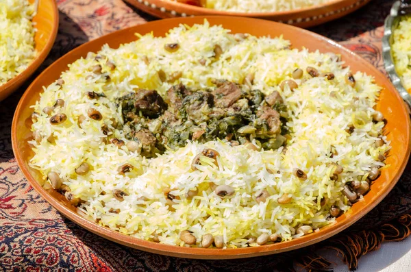 Traditional caucasian rice dish plov with sultana and other dry fruits