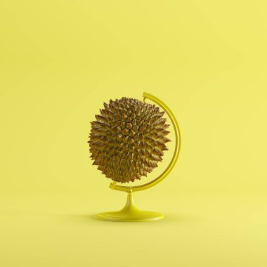 Sarı renkli pastel arka planda Durian küresel fikir kavramı. minimal fikir kavramı.