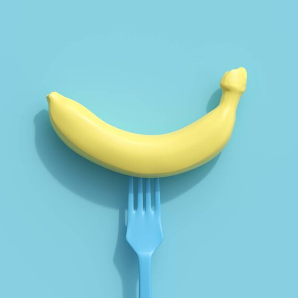 Yellow banana on a blue fork on blue background. creative idea concept.