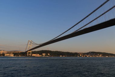 Bosporus Bridge in the sunset. View from Bosporus Strait