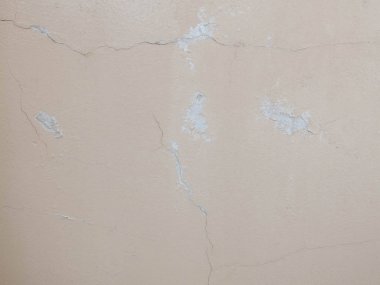 Sıvalı duvar yüzeyinde çatlaklar. Soyut arka plan textur