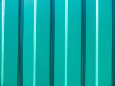 Paslanmaz yeşil renkli galvanizli profil kağıdı. Arka plan ya da doku konsepti. Üst Manzara. Kusursuz desen.