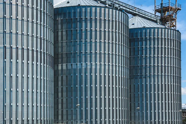 Modern building for storing grain against the blue sk