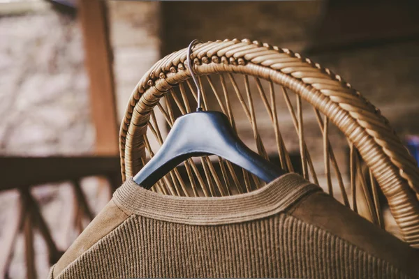 Autumn Story Woolen Knitted Jacket Hangs Hanger Back Wicker Chair — Stock Photo, Image