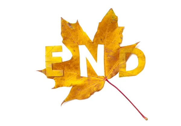 Einde. Letters gesneden uit wig bladeren — Stockfoto