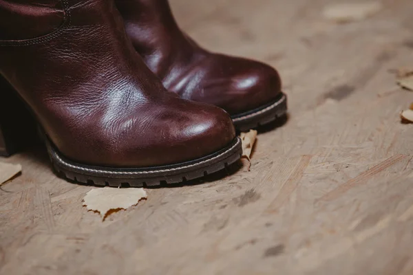 Women leather boots close up — ストック写真