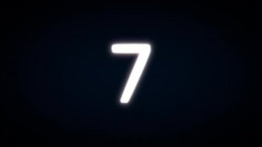 Modern geri sayım sonunda destansı patlamayla 9 'dan 0' a sayıları değiştiriyor. Koyu arkaplan, parlak beyaz sayılar. 4K hareket grafiği
