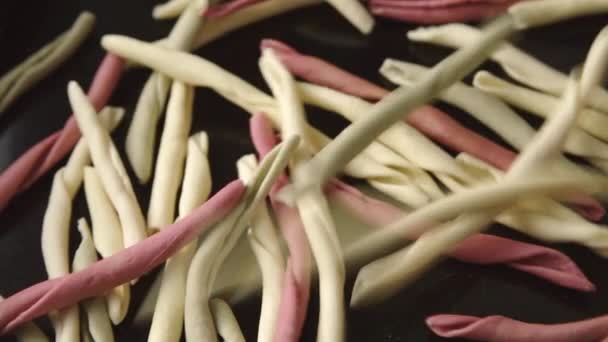 Traditional Raw Italian Fileja Pasta Various Colors Drops Continuous Stream — Stock Video