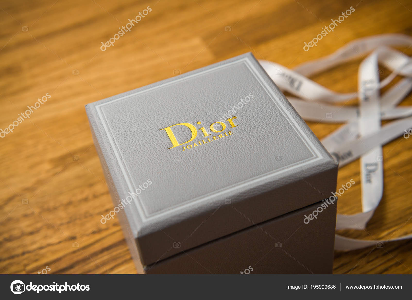 Christian Dior jewelry box after unboxing on table – Stock Editorial Photo  © ifeelstock #195999686