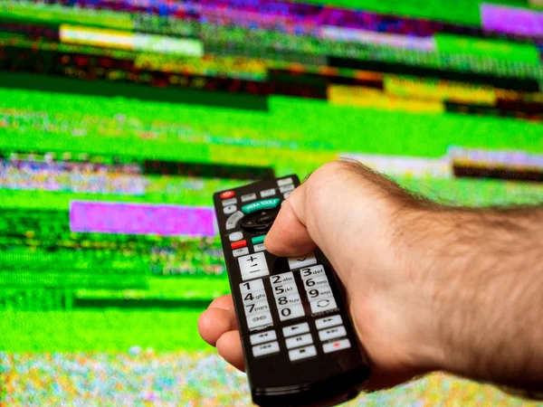 Man hand bad signal bad remote displasy — Stock Photo, Image