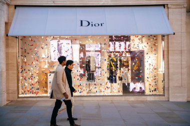 LONDON, UNITED KINGDOM - MAY 18, 2018: Congratulation message from Christian Dior fashion boutique to  HRH Prince Harry of Wales KCVO and Ms Meghan Markle flagship store on Regent street for Royal Wedding  clipart