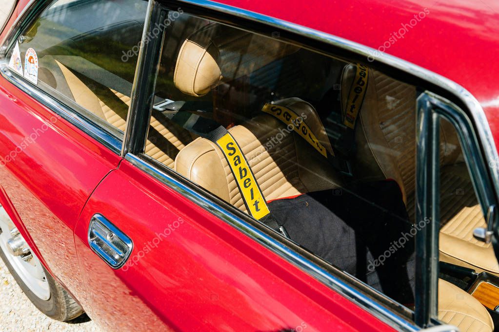 STRASBOURG, FRANCE - APR 30, 2018: Sabelt professional safety belt inside Alfa Romeo 2000 vintage car