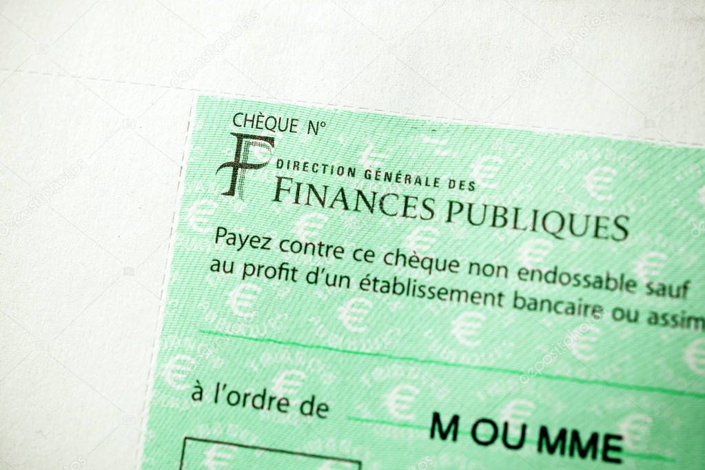 PARIS, FRANCE - JAN 1, 2015: Detail of French Cheque issued by the Direction Generale des Finances Publiques - the division of Economic Minister responsible for income taxes