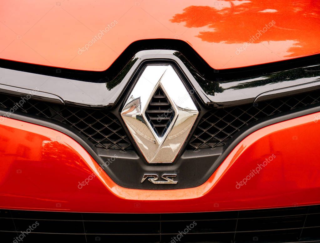 PARIS, FRANCE - APR 3, 2017: Renault RS logo on a luxury red sport Renault car