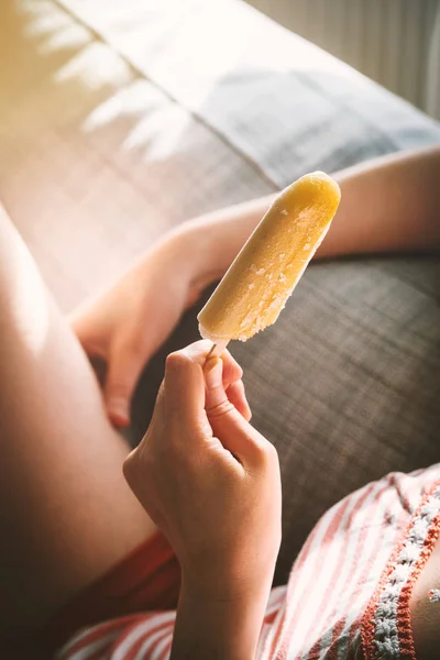 Carefree Relaxed Woman Chilling Sofa Daylight Eating Ice Cream Stick — Stock Photo, Image