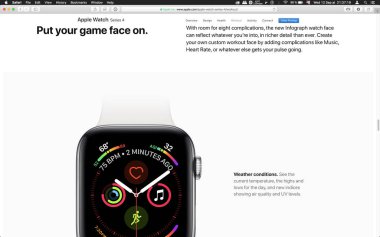 London, Büyük Britanya - 12 Eylül 2018: Apple bilgisayarlar ürün lansmanı sonra bilgisayar Macbook ekranda görülen yüz app komplikasyonlar Apple Watch giyilebilir bilgisayar,