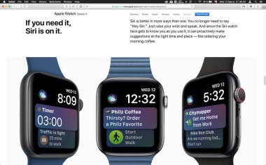 London, Büyük Britanya - 12 Eylül 2018: Siri üzerinde Apple bilgisayarlar ürün lansmanı sonra bilgisayar Macbook ekranda görülen Apple Watch giyilebilir bilgisayar