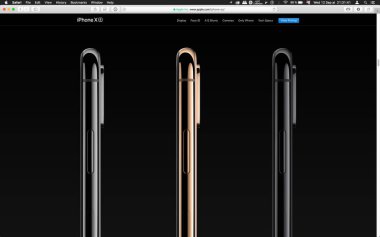 London, Büyük Britanya - 12 Eylül 2018: Cupertino açış sonra ürün lansmanı bilgisayar Macbook ekranda görülen lüks altın elma iphone Xs iphone Xs Max iphone X R smartphone bilgisayar,