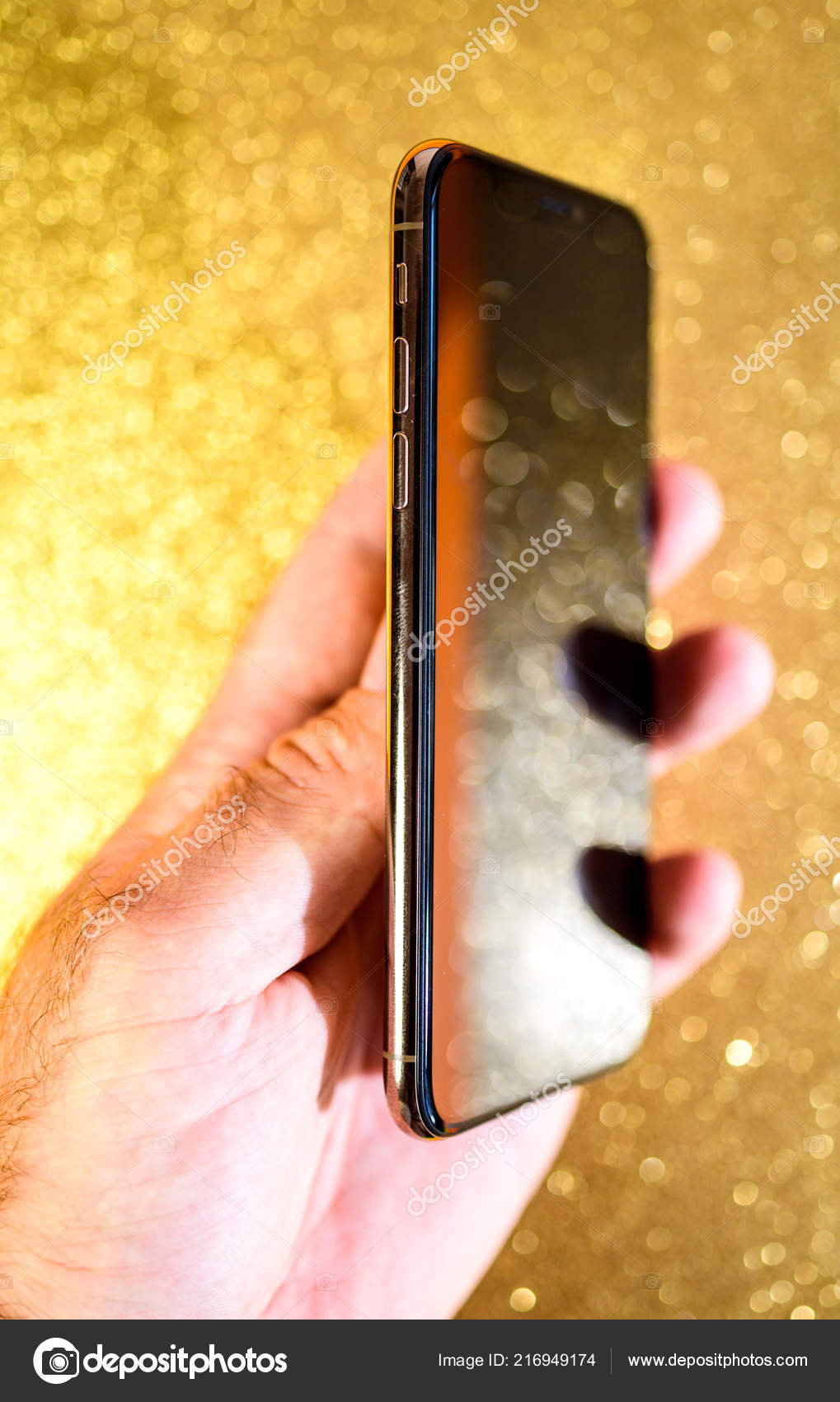 Hand Holding Apple Iphone Xs Max Xr Gold Glitter Sparkle Stock