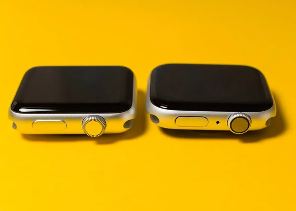 Apple Watch compare Series 3 vs Series 4 yellow background