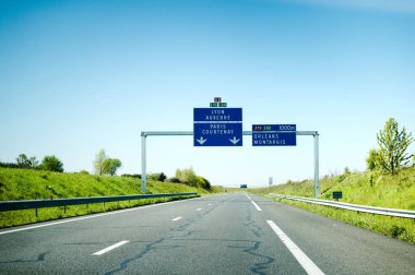 Empty French highway with blue signage clipart