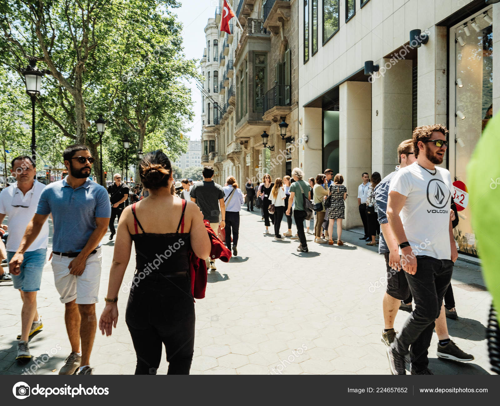 Barcelona, Spain. March 2018: People Walking in Front of Louis