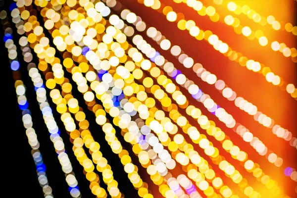 horizontal abstract defocused bokeh illuminated garland view fro