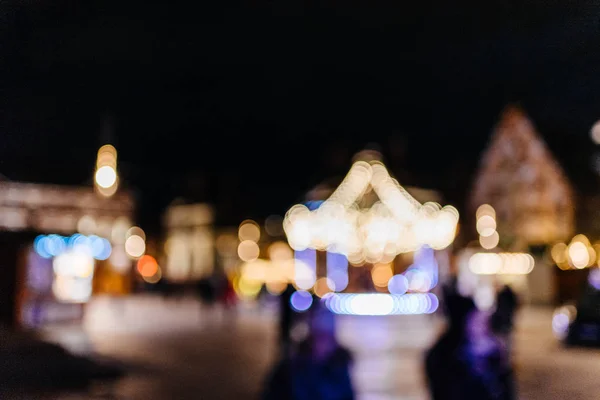 Merry-go-round defokuserede julemarked i Strasbourg - Stock-foto