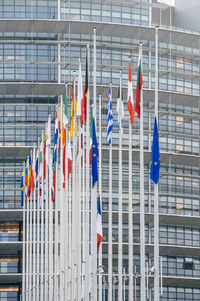 The French Flag flies at half-mast in front of the European Parl