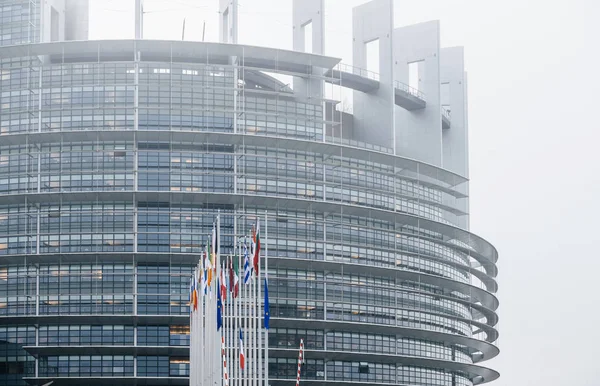 The French Flag flies at half-mast in front of the European Parl — Stock Photo, Image