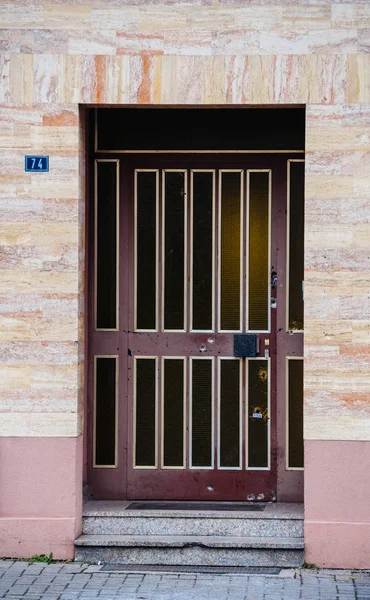 Front view of entrance door with bullet shootings — Stock Photo, Image
