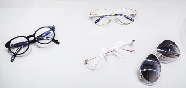 Multiple luxury golden and plastic eyewear — Stock Photo, Image