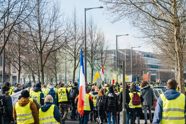 Closed stgreet People Gilets Jaunes or Yellow Vest protest in Strasbourg France 