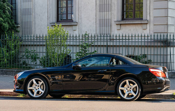 elegant Mercedes-Benz SL coupe car parked street