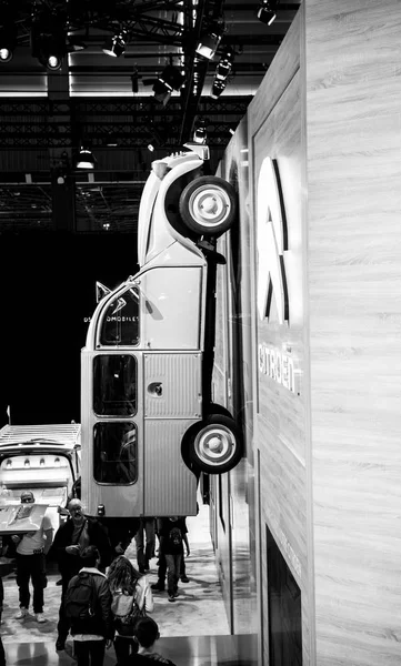 Mondial Paris Motor Show with nvintage Citroen on the wall — стоковое фото