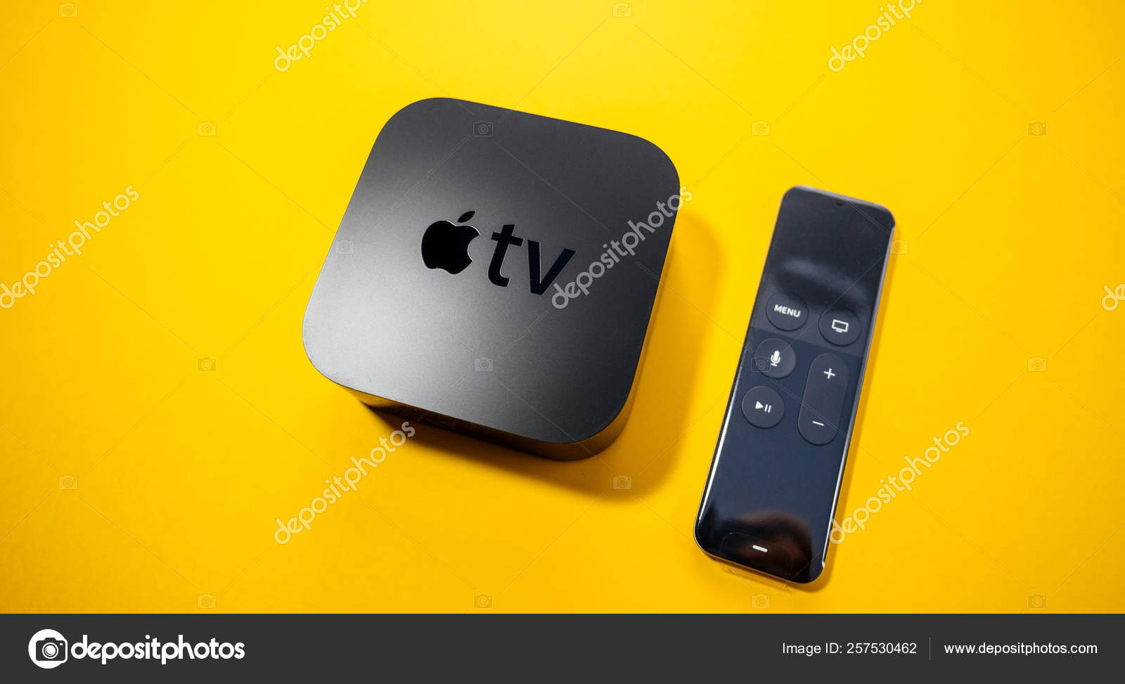 Apple 4k remote control isolate yellow background Stock Editorial Photo © ifeelstock #257530462
