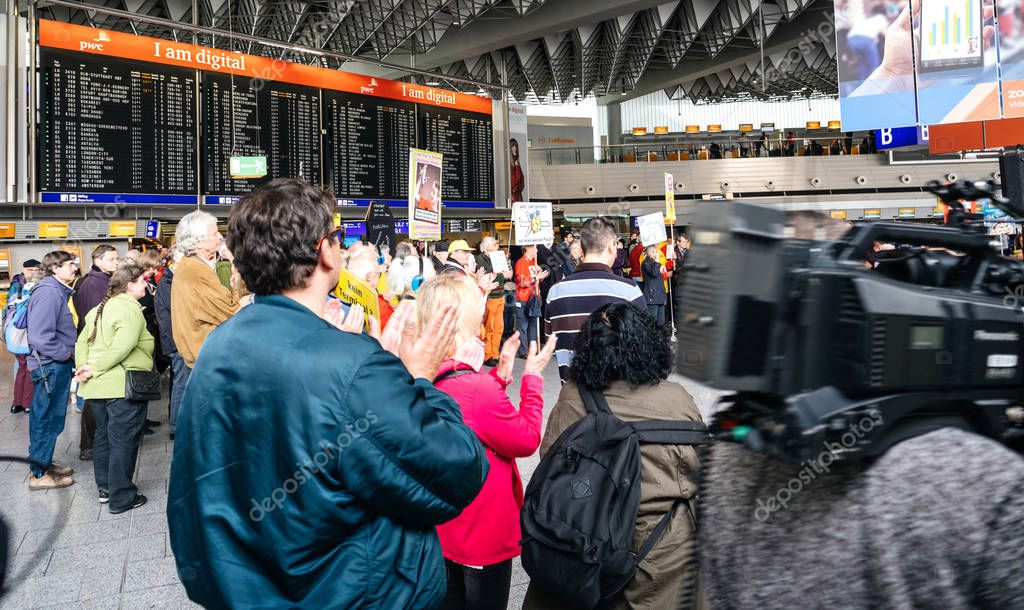 Frankfurt, Germany - Apr 29, 2019: Applause by German people, locals living near Fraport Frankfurt International Airport protesting against construction of Terminal 3