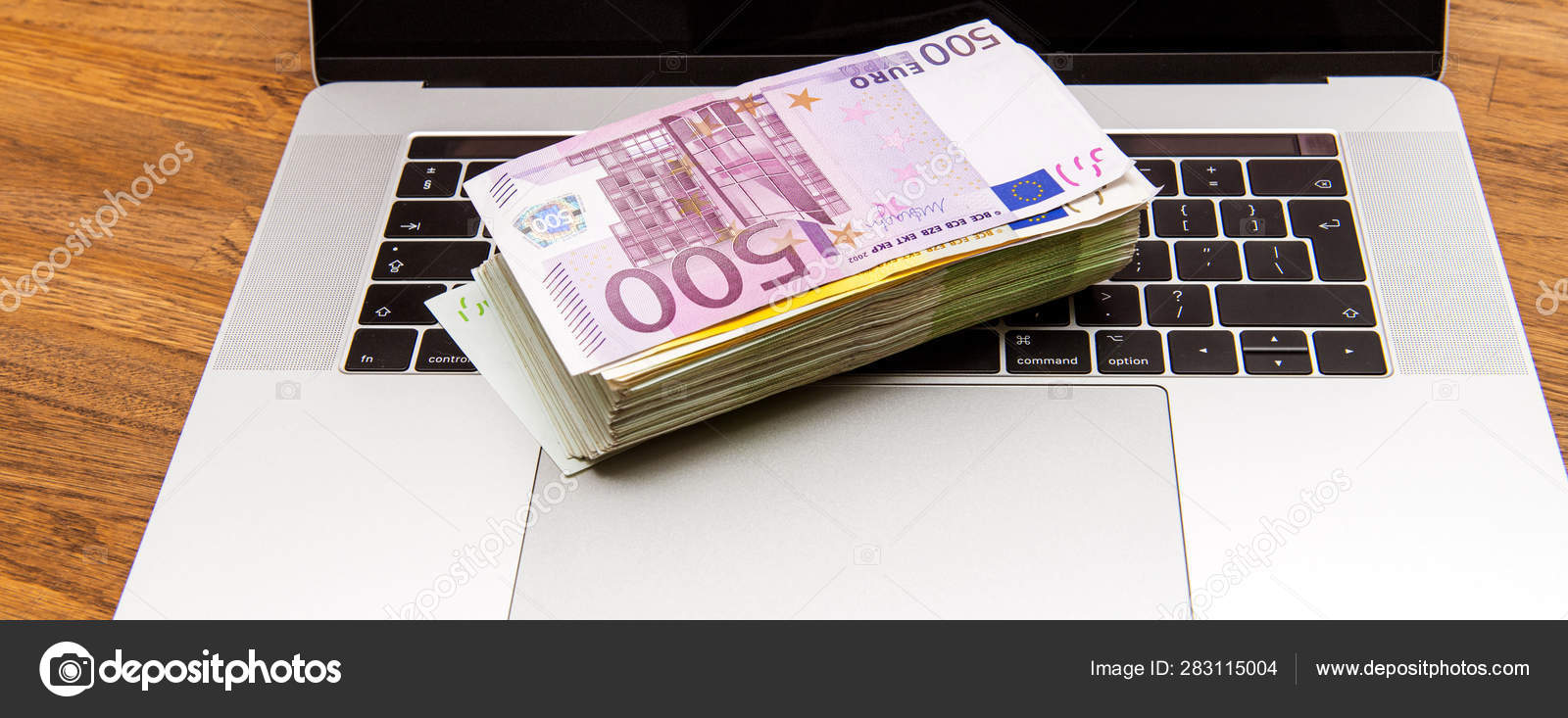 Dosering kennisgeving beweeglijkheid Stack pile of 500 100 200 Euro bank currency laptop Stock Photo by  ©ifeelstock 283115004