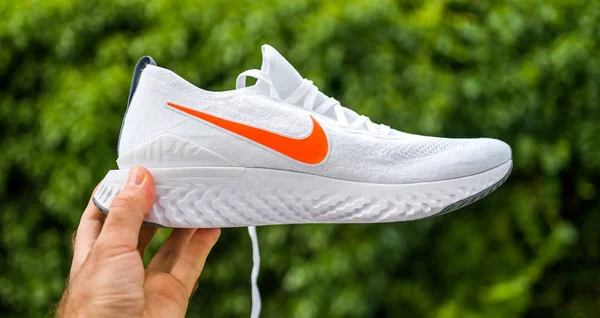 Nike Epic React Flyknit 2 side view with red logotype — Stock Photo, Image